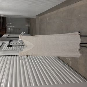 Calvin Klein off white sleeveless dress.